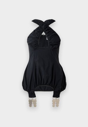 Schwarzes Trägershirt mit gerafftem Stoff, quadratischem Ausschnitt und elastischen Akzenten. Verfügt über einen Reißverschluss vorne und einzigartige dekorative Beschläge am Saum.