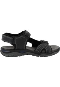 Black sandal with adjustable straps, cushioned footbed, rubber sole, and contrasting white stitching. Open-toe design for breathability.