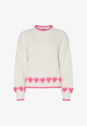 Pull en maille blanche avec un motif de cœur rose le long de l'ourlet et des poignets. Présente un col rond orné d'un bord rose. Texture douce et coupe ample.