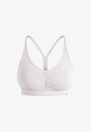 Soutien-gorge de sport gris clair avec une texture douce, détail froncé à l'avant et design dos nageur, présentant des bretelles ajustables et une bande élastique.