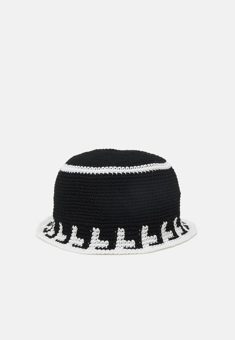 Black crocheted bucket hat with a white band and contrasting decorative pattern along the brim. Textured fabric, round shape, and flexible fit.