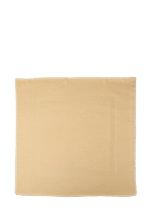 Beige rektangulær plaid med subtile teksturerede mønstre, frynser langs kanterne, lavet af blødt stof, designet til dekorativt eller praktisk brug.