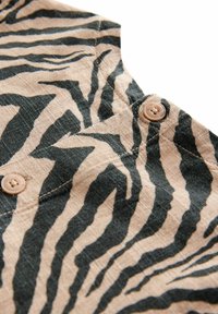 Unselected, black brown zebra print