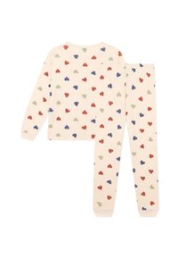Pyjama beige clair avec un motif de petits cœurs rouges, verts et bleus, à manches longues et pantalons, fabriqué dans un tissu doux.