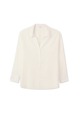 Camicia bianca con bottoni, colletto e maniche a tre quarti. Realizzata in tessuto morbido, con una vestibilità rilassata e senza motivi particolari.