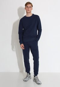 Carlheim UNIVERSAL NOEL COMFORT - Sportska majica - navy