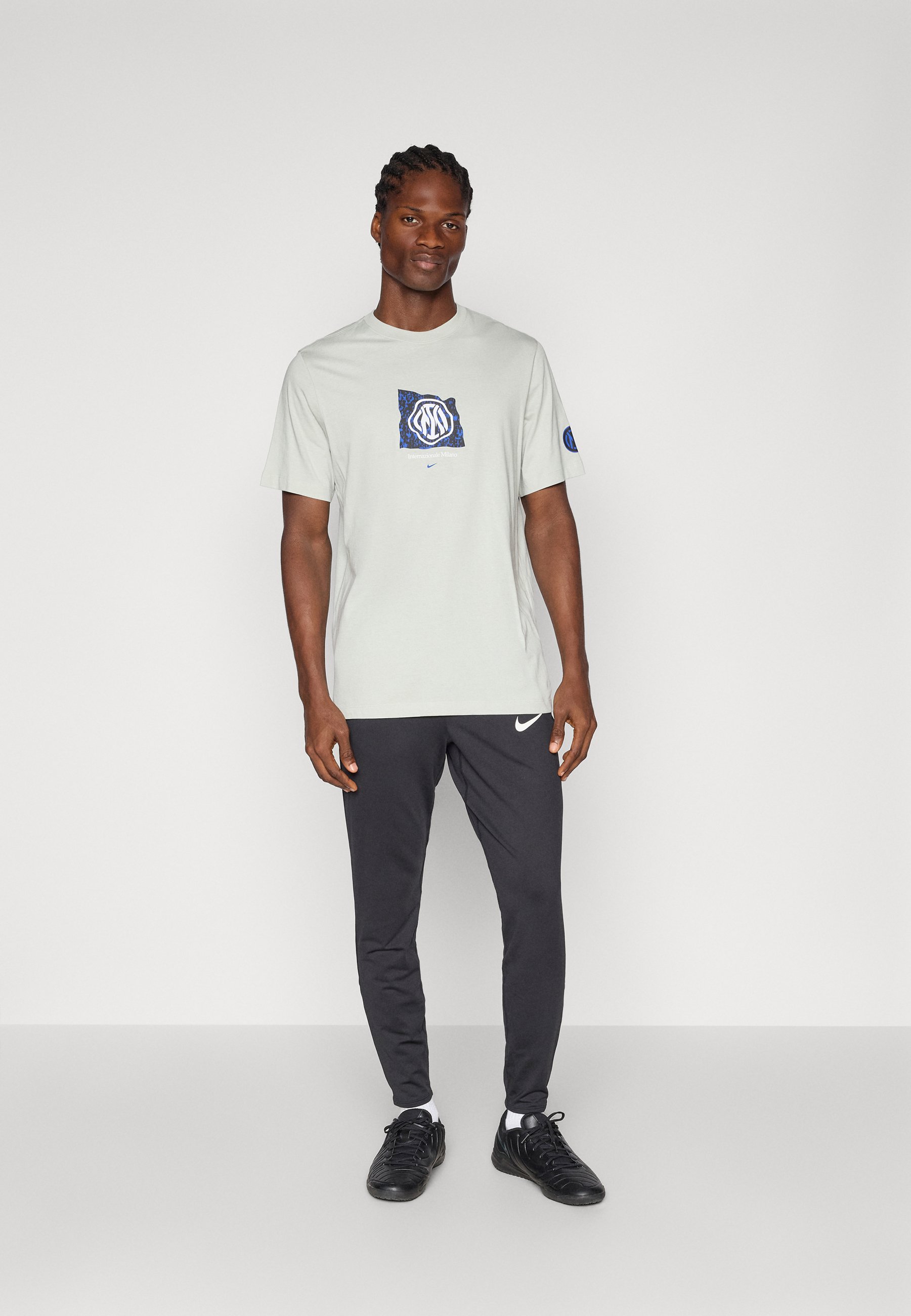 grey and blue nike shirt