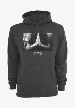 Tmavosivá mikina s kapucňou so predným grafickým motívom rúk v modlitebnej polohe, s textom "modli sa" pod ním. Vyrobená z mäkkej, štruktúrovanej látky.