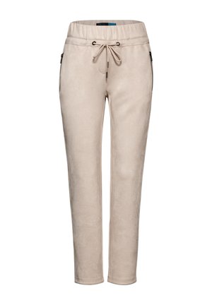 Beige collegehousut, jotka on valmistettu pehmeästä materiaalista. Varustettu elastisella vyötäröllä, naruilla ja sivutaskuilla. Slim fit -leikkauksella, jossa on kapenevat nilkat.
