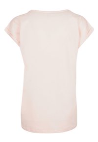 Lys rosa bomull t-skjorte med rund hals, korte rullede ermer og rett skjortekant, med en glatt tekstur.