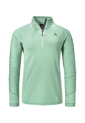 Mint green long-sleeve pullover with a half-zip collar, textured fabric, stitched seams, and a logo on the upper left chest.