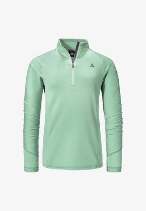 Mint green long-sleeve pullover with a half-zip collar, textured fabric, stitched seams, and a logo on the upper left chest.