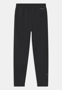 Black athletic pants made of moisture-wicking fabric. Features an elastic waistband, tapered design, and minimal branding on the side.