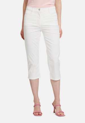Pantaloni cropped bianchi con una vestibilità slim e leggermente elasticizzati. Presentano una chiusura frontale con bottone e due tasche laterali. Tessuto dallo spessore morbido.