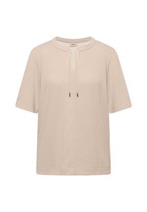 Haut en maille beige à manches courtes avec encolure ronde et détail noué à l'avant, en tissu texturé et coupe décontractée.