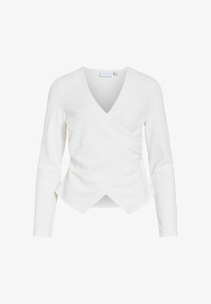 Blouse blanche à manches longues de style cache-cœur avec col en V et ourlet avant asymétrique superposé.