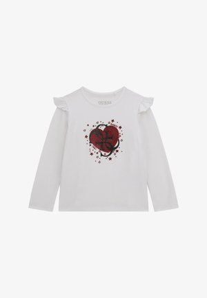 Weißes Langarmhemd mit Rüschendetails an den Schultern, das ein glänzendes rotes Herzmotif mit Sternen und Text in einem gemischten Design zeigt.