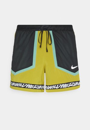 STRIDE - Sports shorts - tent/healing jade /black