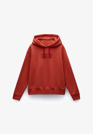 Red hooded sweatshirt with a front logo patch, drawstring detail, and ribbed cuffs and hem. Made of soft cotton blend fabric.