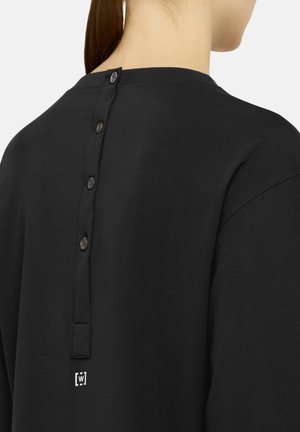 Wolford, AURORA PURE CUT TOP L.SLEEVES - T-shirt à manches longues - black