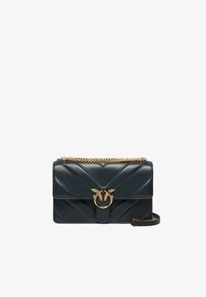 Borsa a tracolla in pelle trapuntata nera con catena dorata e dettaglio di chiusura a forma di uccello dorato sulla patta frontale.