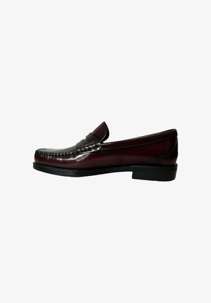 Burgundy leather loafers with a smooth finish, featuring stitching details and a low black sole. Classic design with raised seam accents.