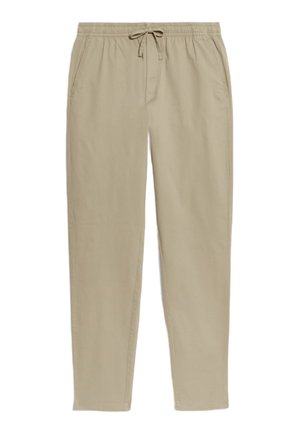 Beige Baumwoll-Loungehosen mit elastischem Bund und Kordelzug, ausgestattet mit Taschen an den Seiten und einem geraden Hosenbein.