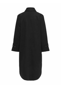 Juodas vilnonis paltas su tiesia siluetu, apykaklė su atvartais ir ilgomis rankovėmis. Yra sagčių akcentai ant rankovių, sukurti stilingam vaizdui.