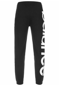 Pantalones de chándal negros con una cinturilla elástica, que presentan un gran logo blanco impreso verticalmente a lo largo de la pierna izquierda. Material de algodón suave.