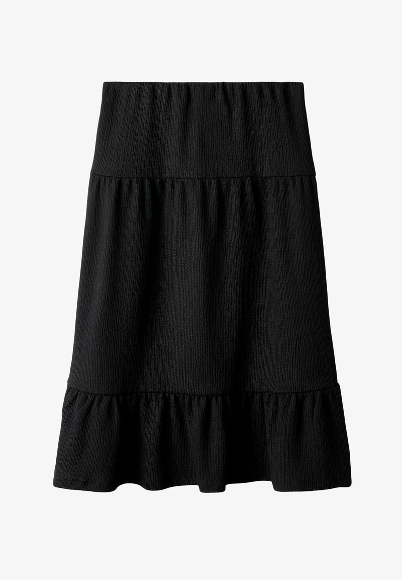 Jupe noire en tissu texturé et côtelé, dotée d'une large taille élastique et d'un détail en volants évasés à l'ourlet.
