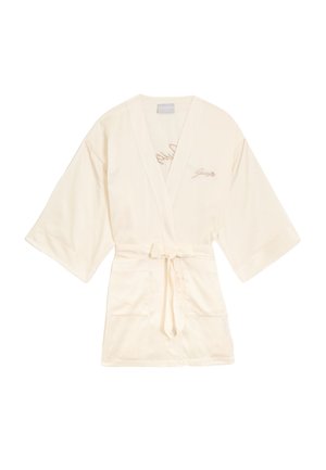 Robe en satin couleur crème avec un design croisé, des manches larges et une ceinture à nouer. Présente des broderies décoratives sur la poitrine et deux poches à l'avant.