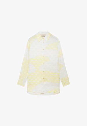 Chemise à manches longues avec boutons, col pointu, présentant un motif abstrait de rayures horizontales jaune pâle et blanches.