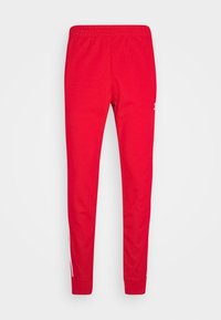 adidas Originals Teplákové kalhoty - red
