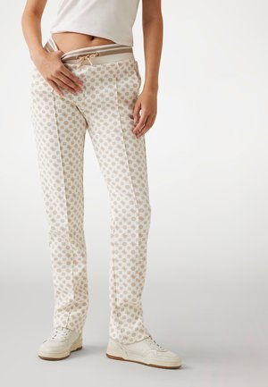 LOGO - Tracksuit bottoms - mehrfarbig beige
