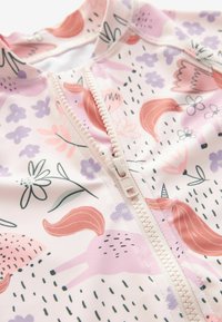 Next SUNSAFE-REGULAR FIT - Jednodílné plavky - neutral unicorn