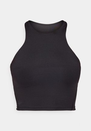 Crop top noir sans manches fabriqué en tissu extensible, présentant une encolure haute et un design ajusté avec des bords lisses et sans couture.