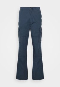 Marinkampbyxor i ett slitstarkt tyg, med utställda ben, två sidofickor och knappstängning i midjan.