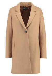 Cappotto tan con colletto a linguetta, chiusura con un solo bottone, tessuto strutturato e due tasche laterali; foderato con un interno marrone a contrasto.