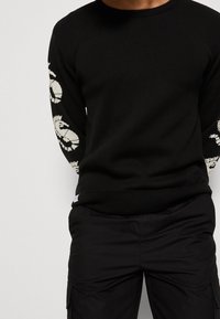 Makia Strickpullover - black
