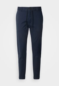 Navy blue pants with an elastic waistband and drawstring. Features a smooth, lightweight fabric and slim tapered legs. Suitable for casual wear.