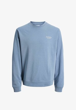Sweat-shirt bleu avec col rond et manches longues. Fabriqué en tissu de coton doux avec un logo discret blanc sur la poitrine.