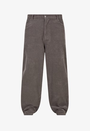 Grå corduroy bukser med en lodret ribbet tekstur, med lige snit, bæltestropper og en elastisk kant ved anklerne.