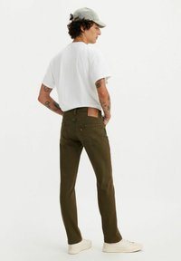 Levi's® Vaqueros tapered - moto cross adv