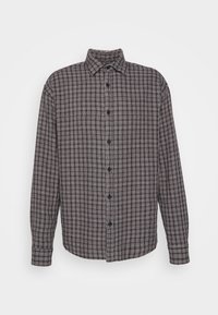 Karierte Hemdjacke aus gewebtem Stoff; mit schwarzen, weißen und grauen Mustern, einem Kragen und langen Ärmeln mit Knopfmanschetten.