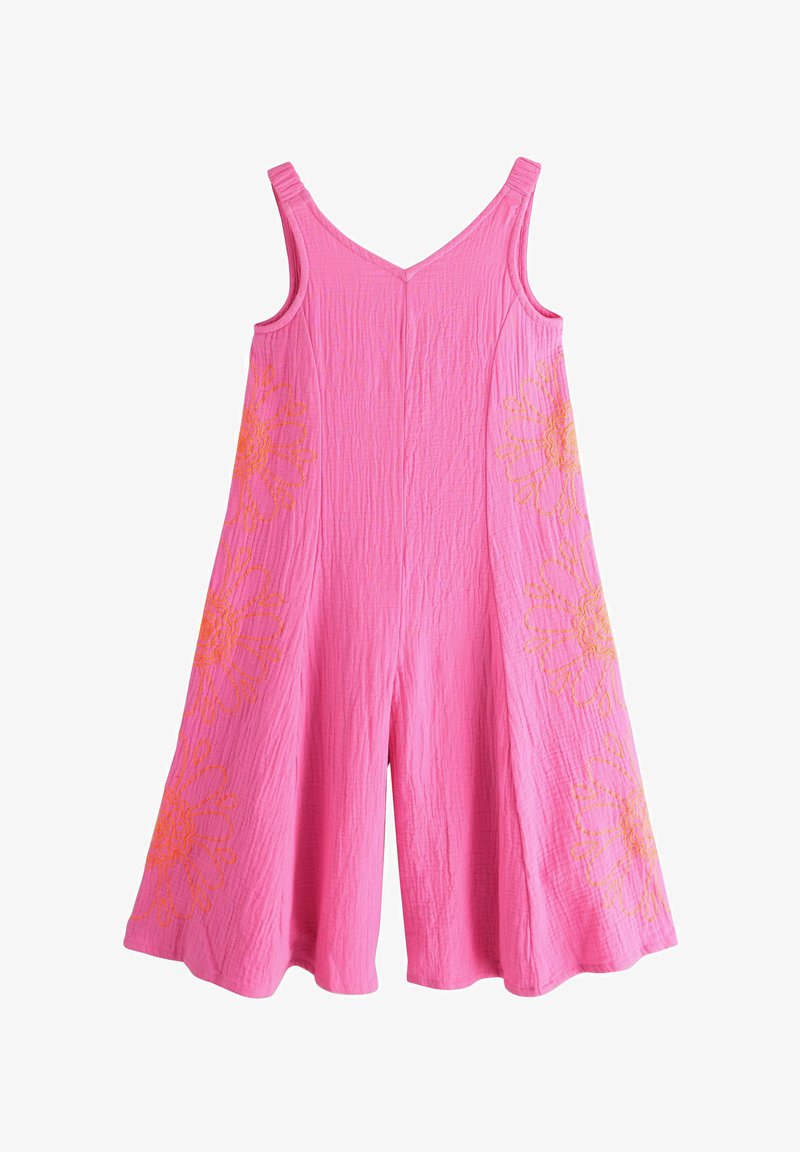Tuta rosa senza maniche con pantaloni a gamba larga, con stampe floreali arancioni sui lati e scollo a V, realizzata in tessuto strutturato.