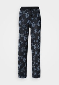 Pantalon noir avec taille à cordon, présentant un motif texturé de étoiles bleues, de lunes et d'autres formes célestes.