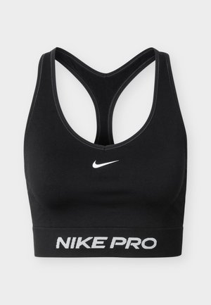 Must Nike Pro spordirinnahoidja racerback disainiga, valge Nike logoga ees ja "NIKE PRO" tekst alumisel ribal.