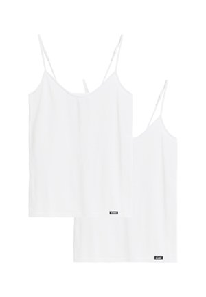 Dwie proste białe bezrękawniki na cienkich regulowanych ramiączkach z małymi czarnymi metkami "Atlantic" przy dolnym brzegu.