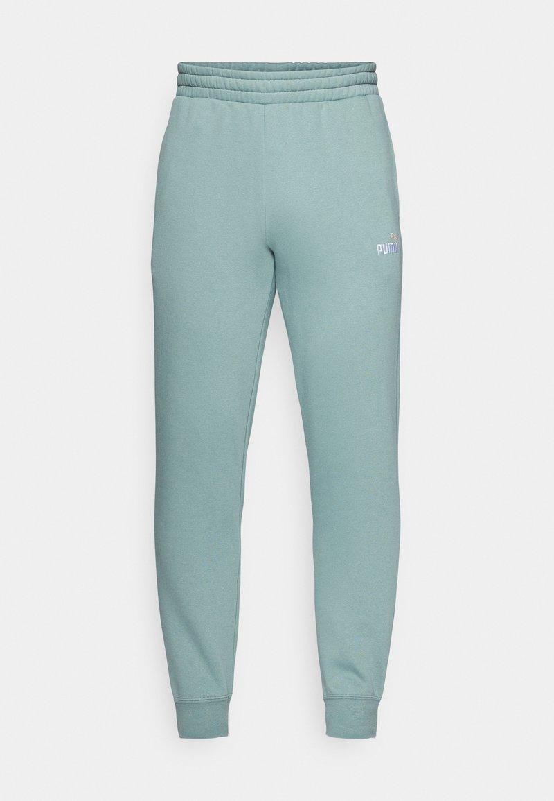 Pantaloni sportivi verde chiaro con vita a costine, gambe affusolate e logo PUMA bianco sulla coscia sinistra. Materiale morbido in misto cotone.