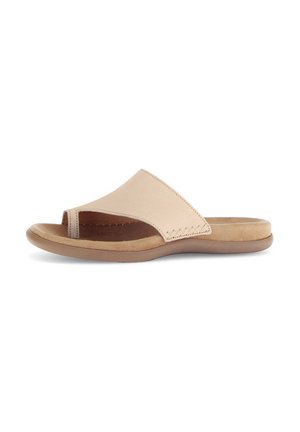 Beige leather slide sandal with an open toe and a curved design. Features a soft, suede-like insole and a light brown rubber sole.
